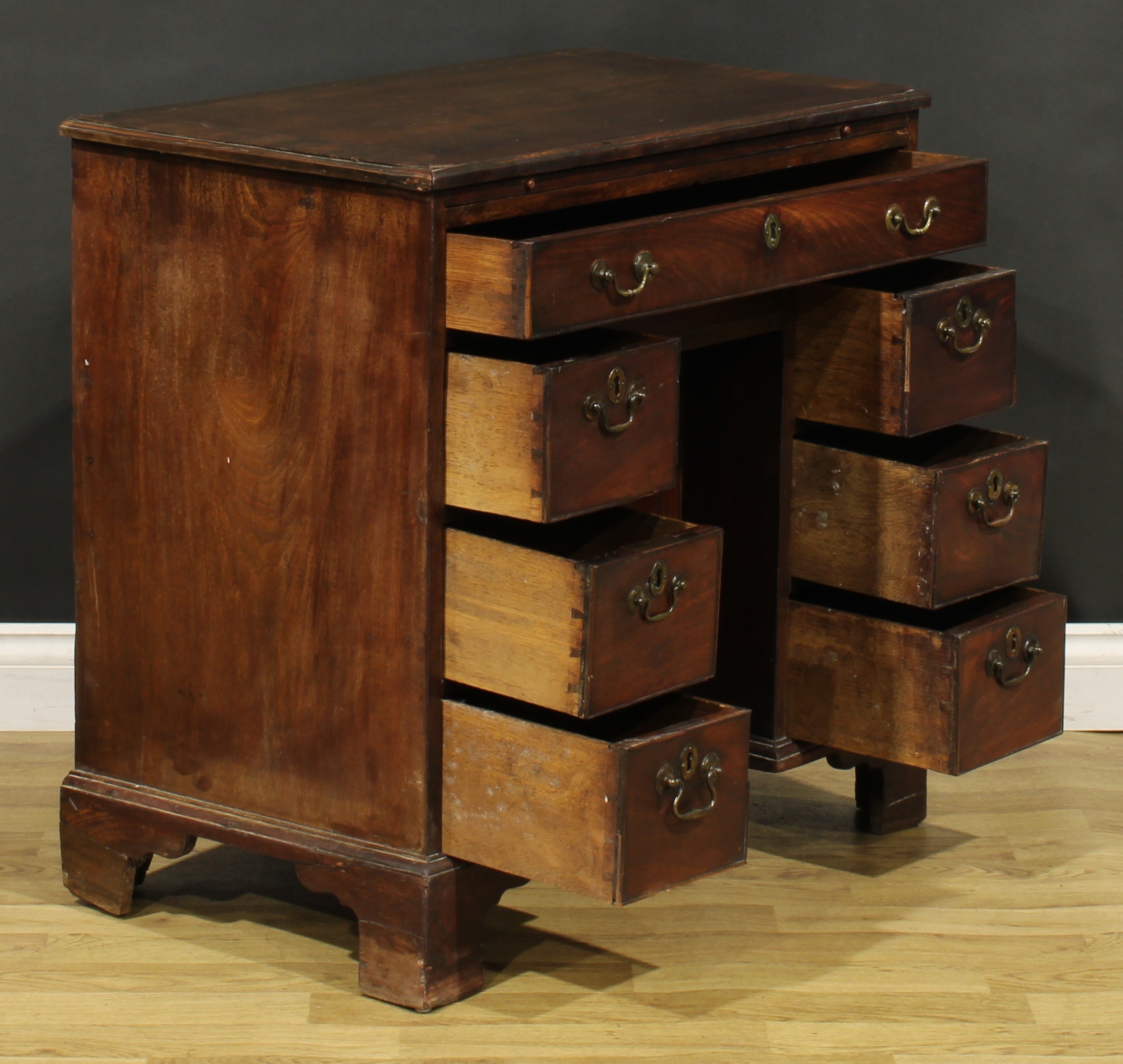 A George III mahogany kneehole desk, slightly oversailing top with moulded edge above a slide and - Image 6 of 8