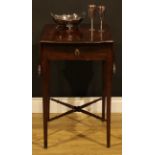 A George III mahogany butterfly Pembroke table, shaped top with fall leaves above a single frieze