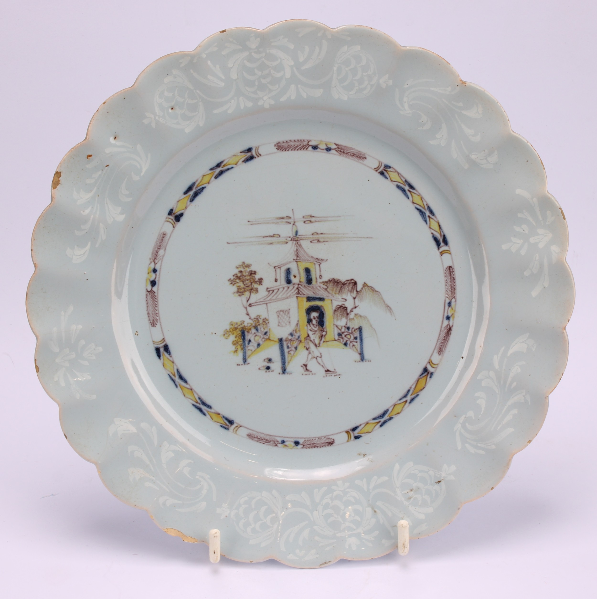 An 18th century Delft circular plate, painted in the chinoiserie taste with a figure in a Chinese - Image 18 of 18