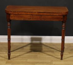 A Regency rosewood crossbanded mahogany card table, hinged top enclosing a baize lined playing