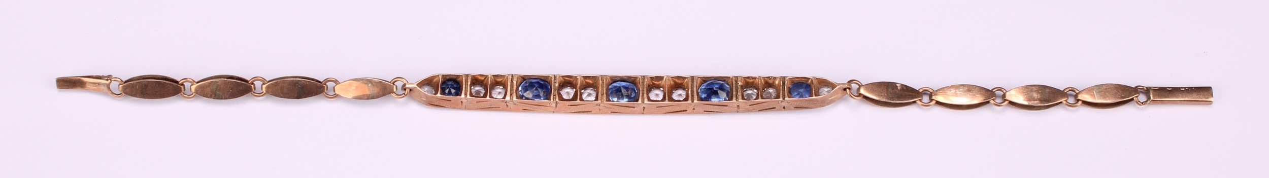 A rose metal mounted bluie and white sapphire articulated bracelet, set with five graduated blue - Image 3 of 5