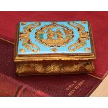 An 18th century gilt metal and enamel waisted rectangular table snuff box, hinged cover decorated in