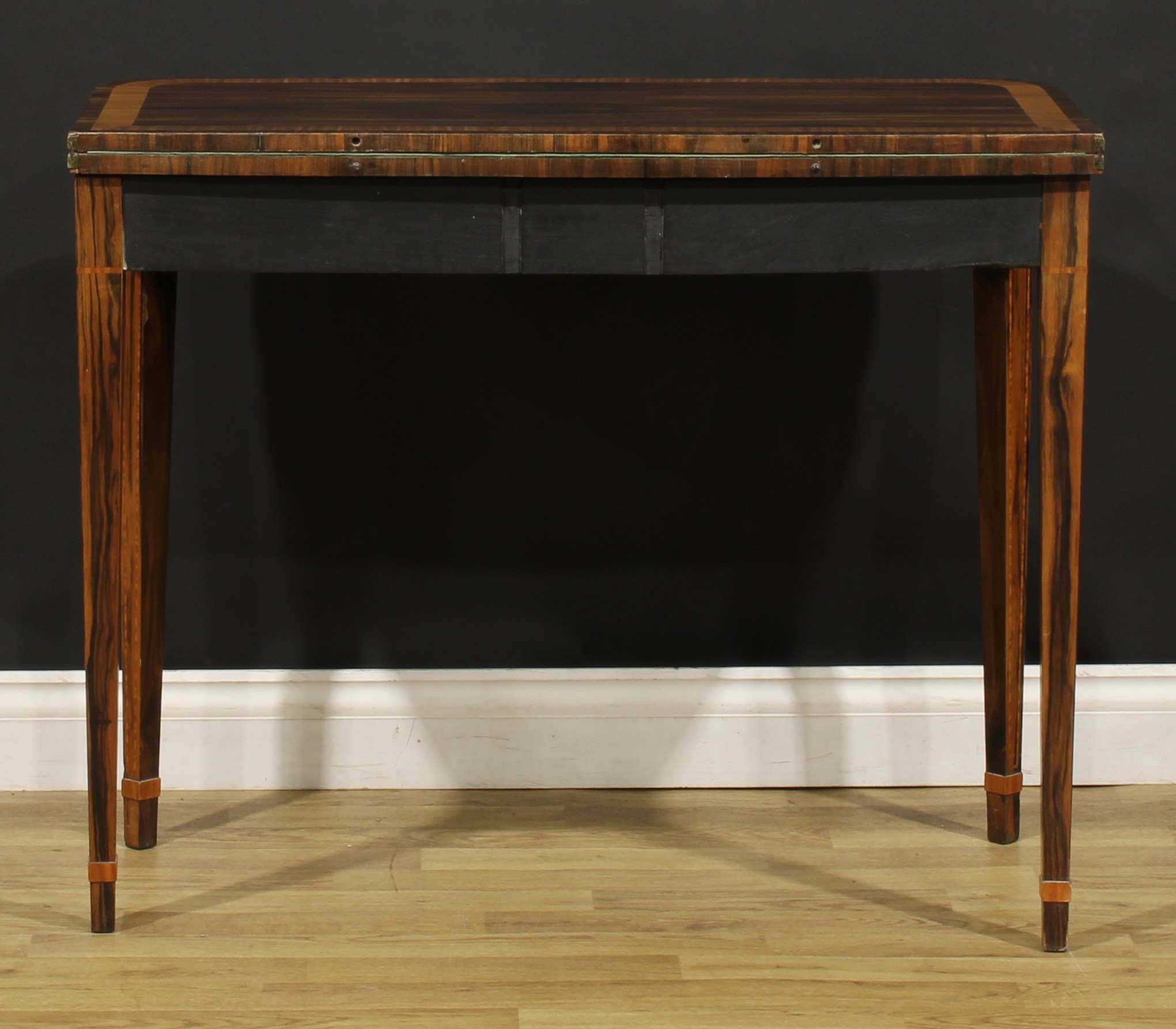 A George III satinwood crossbanded coromandel card table, hinged top enclosing a baize lined playing - Image 6 of 6