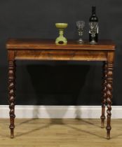 A 19th century mahogany tea table, rounded rectangular folding top above a flame veneered cushion