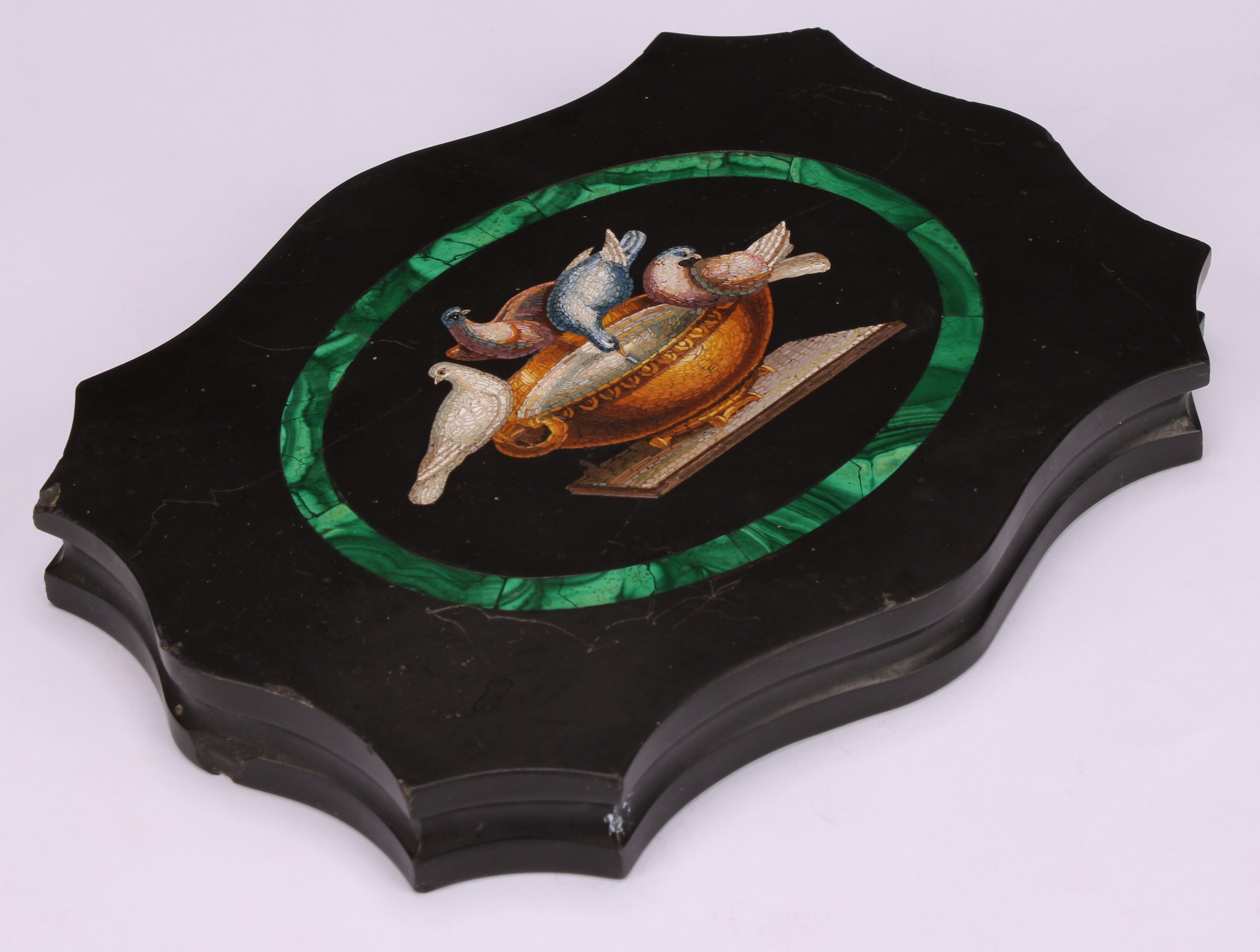 An Italian Grand Tour micro-mosaic cartouche shaped black marble desk weight, decorated in - Image 3 of 5