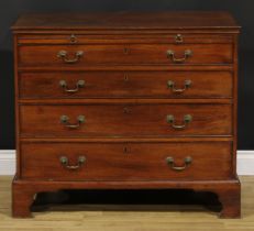 A George III mahogany bachelor’s chest, rectangular top above a slide and four long graduated