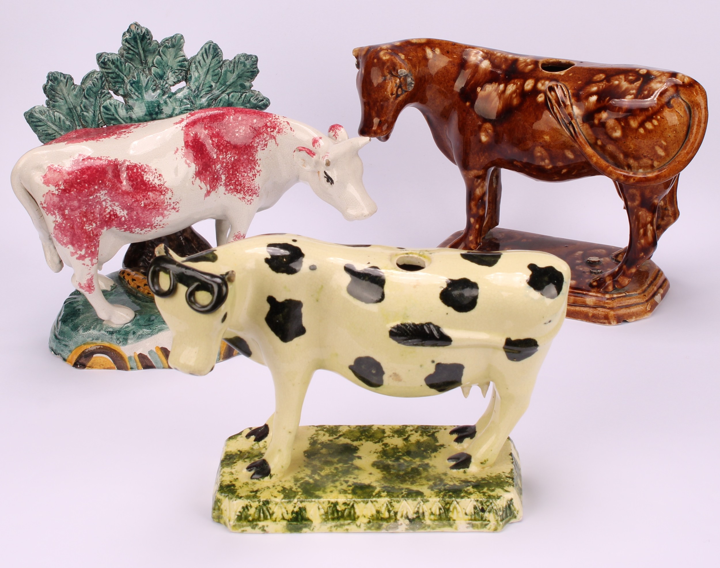An early 19th Staffordshire spongeware cow creamer, as a dairy cow, 12cm; a 19th century - Image 2 of 11