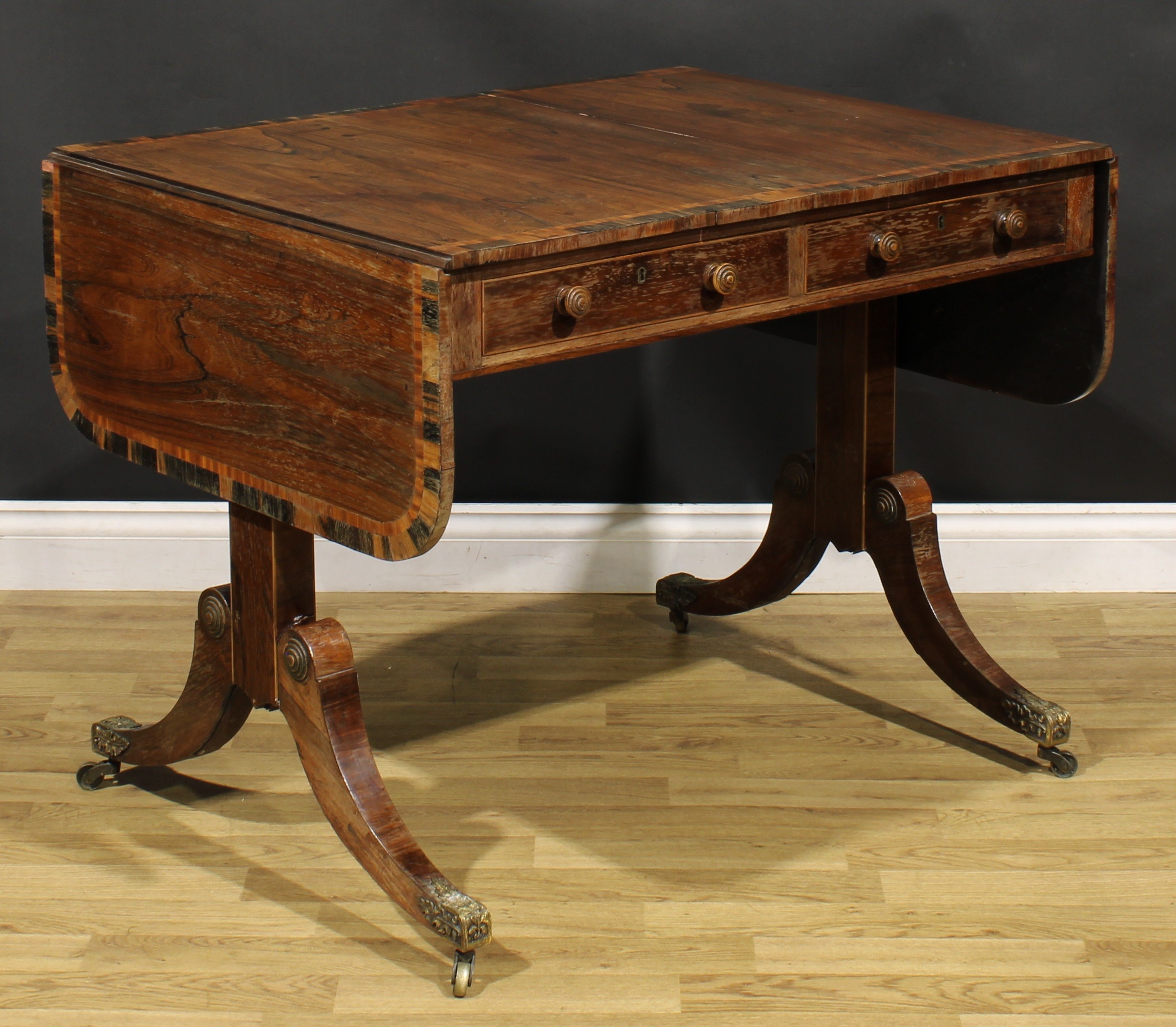 A Regency rosewood sofa table, crossbanded rounded rectangular top with fall leaves, above a pair of - Image 4 of 7