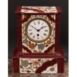 An Aesthetic Movement earthenware mantel timepiece, 9.5cm enamel clock dial inscribed with Roman