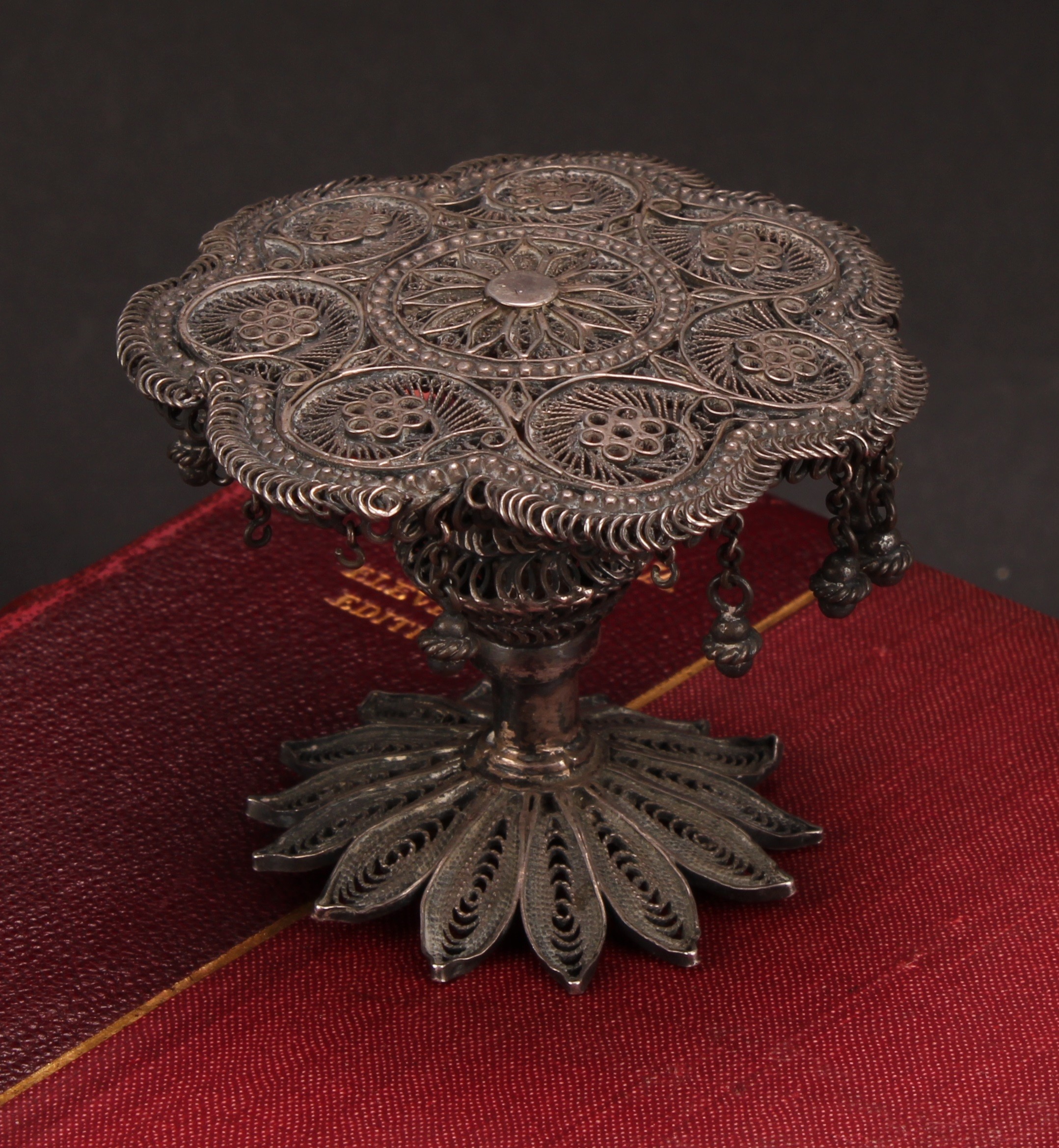 A Continental silver filigree novelty miniature table, possibly Maltese, 7cm diam, 19th century