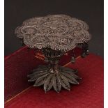 A Continental silver filigree novelty miniature table, possibly Maltese, 7cm diam, 19th century
