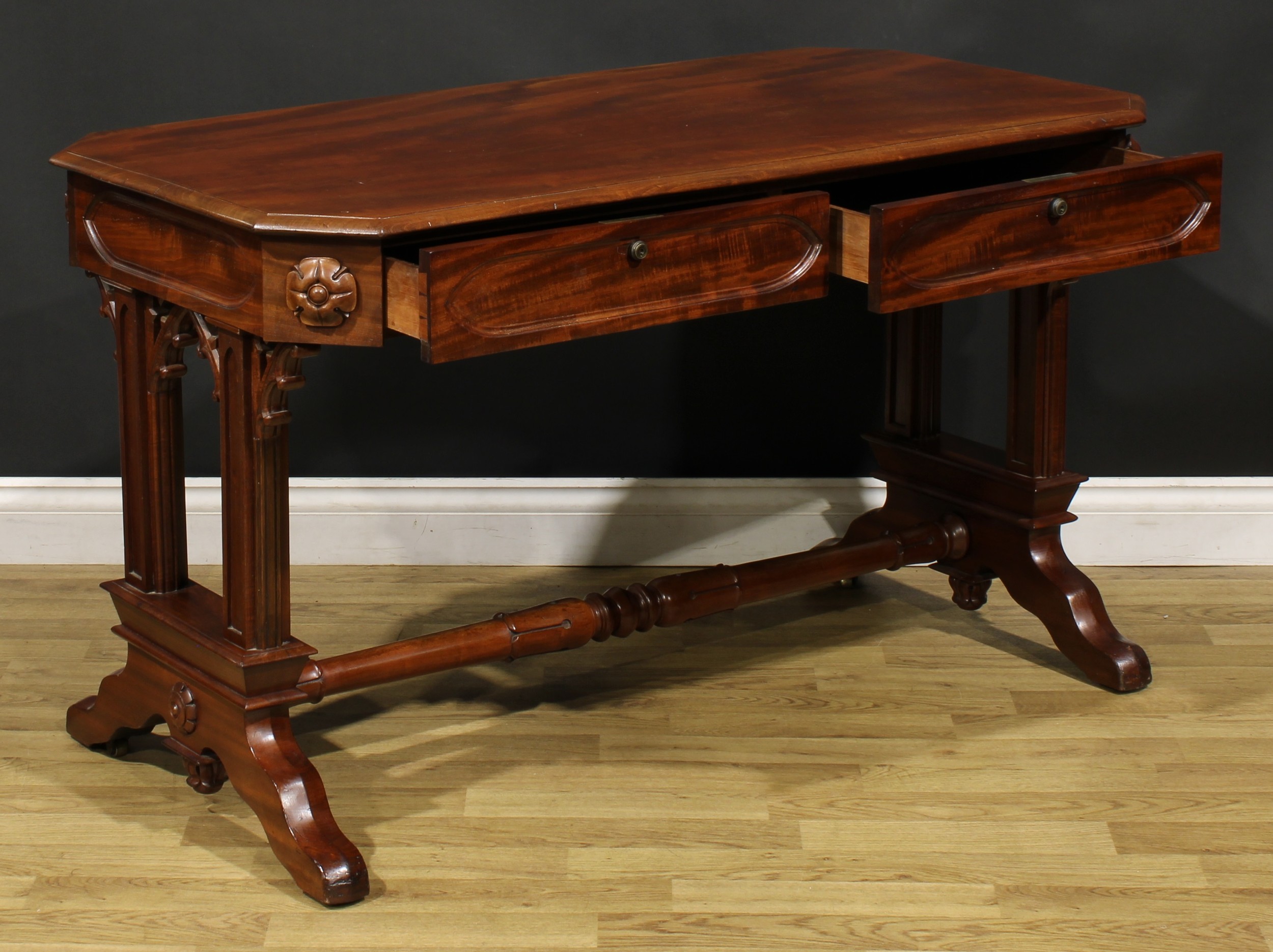 A Post-Regency Gothic Revival mahogany library table, canted rectangular top with moulded edge above - Image 4 of 6