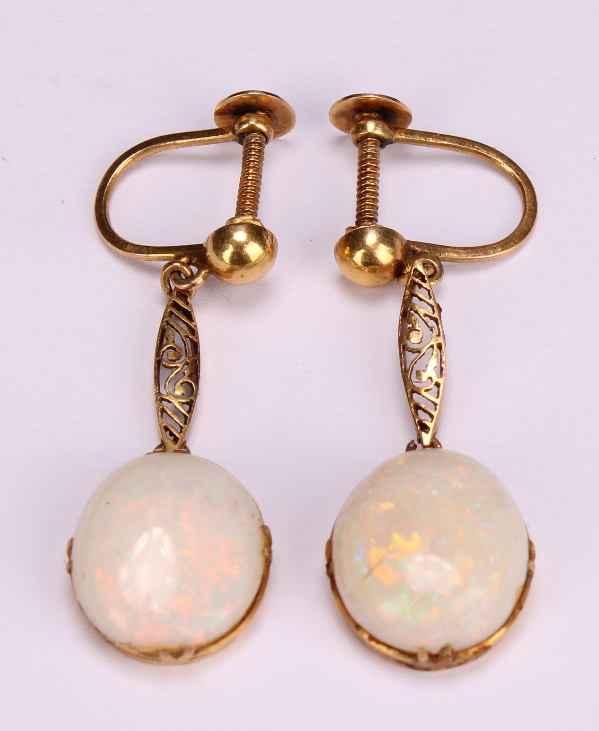 A pair of opal drop earrings, each with a single oval polished opal cabochon, unmarked yellow - Image 2 of 3