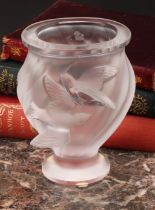 A Lalique 'Rosine' ovoid pedestal vase, of wrythen form, relief decorated with two birds, engraved