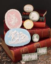 A collection of jasperware cameo plaques, various Grand Tour and historical subjects, the largest
