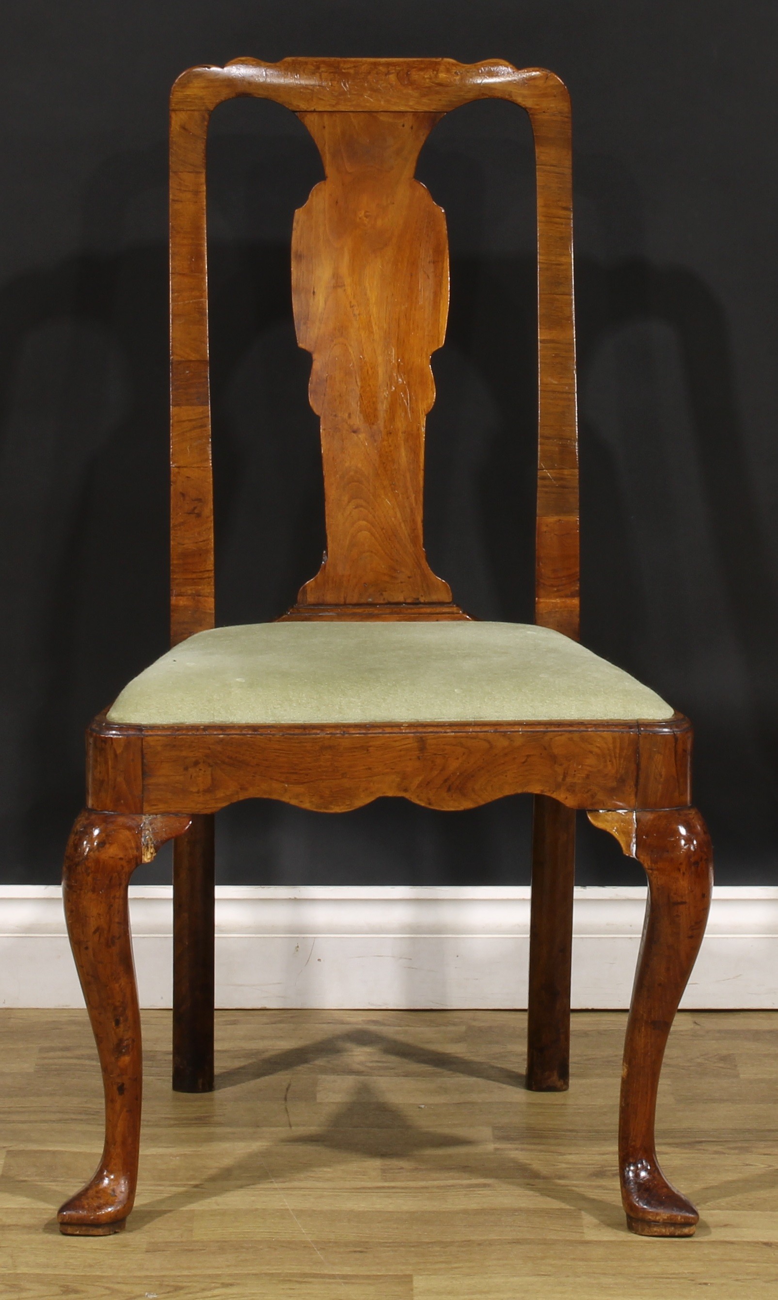 A George I walnut side chair, vasular splat, drop-in seat, cabriole legs, pointed pad feet, 96cm