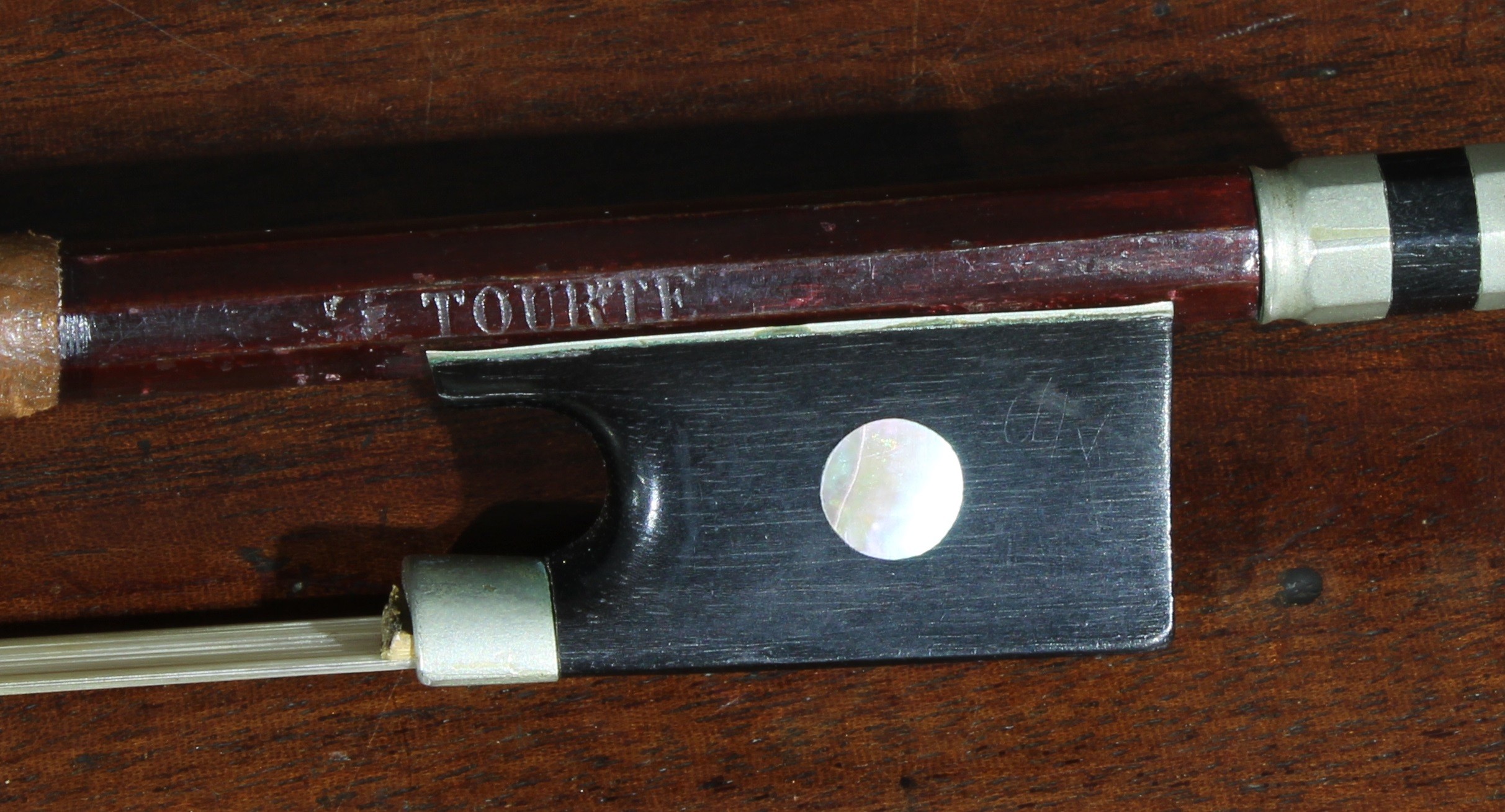 A violin bow, stamped tourte, 73cm long - Image 2 of 2