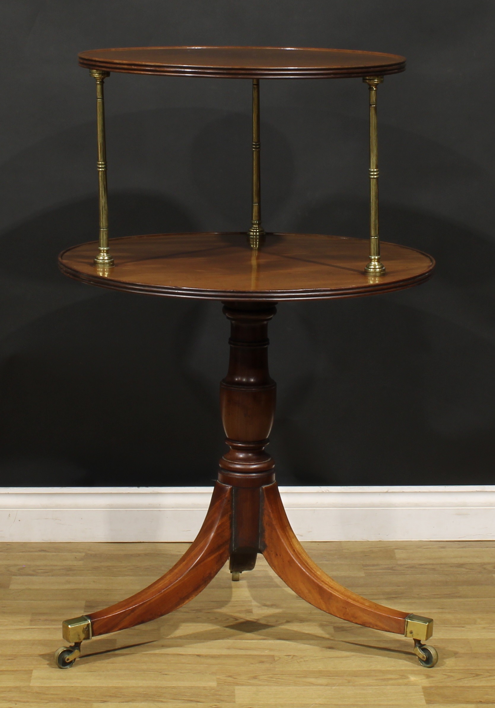 A Regency mahogany two-tier dumbwaiter, circular plateaux with reeded edge, brass columnar supports, - Image 2 of 4