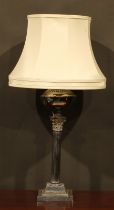 An Edwardian E.P.N.S Corinthian column table lamp, of military interest, engraved with the