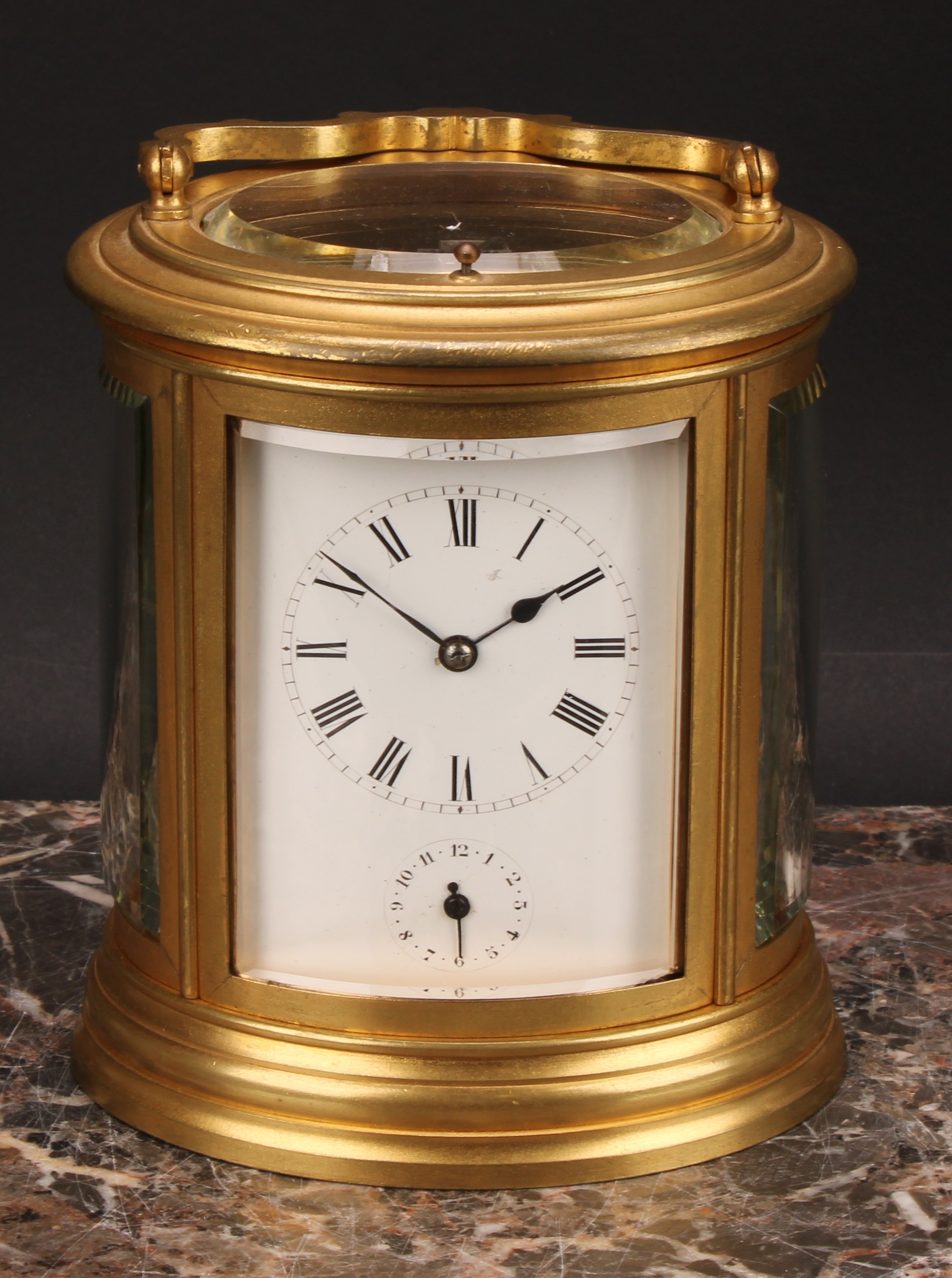 A late 19th century gilt brass oval repeating alarum carriage clock, 7cm enamel dial with Roman - Image 3 of 7