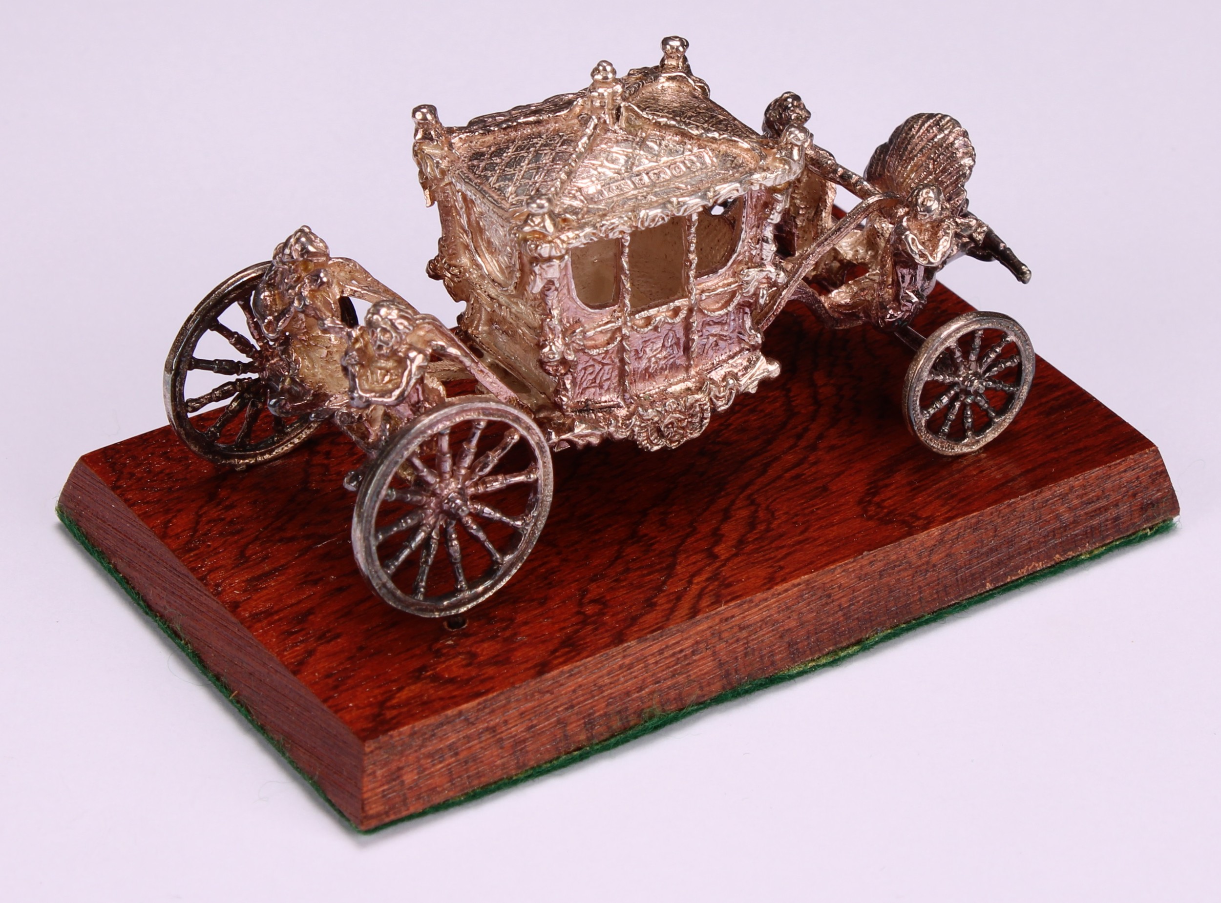 An Elizabeth II cast silver royal commemorative model, the State Coach, 7.5cm long, Birmingham 1977, - Image 5 of 6