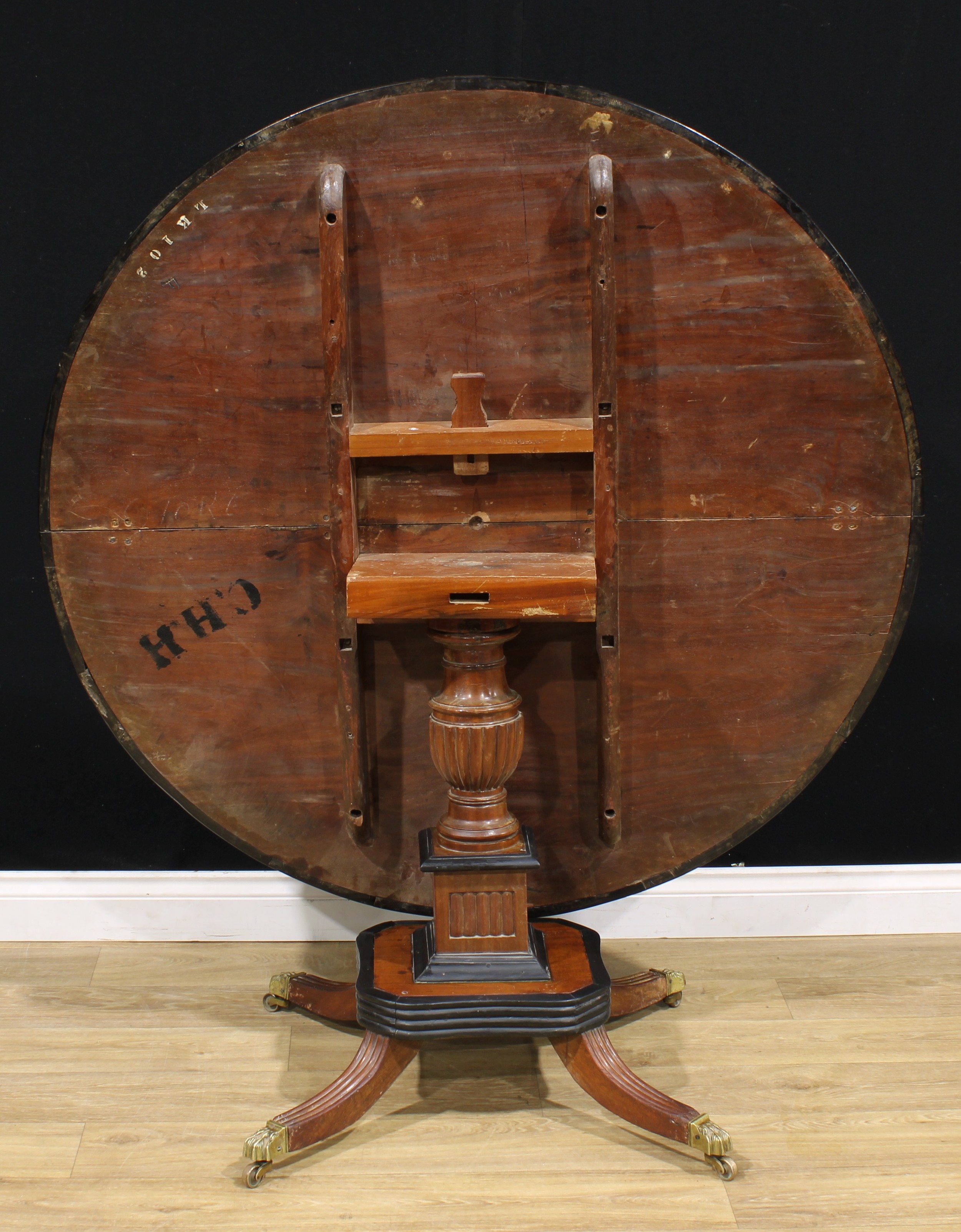 A 19th century Indo-Dutch jackfruit and ebonised centre table, circular tilting top turned and - Image 4 of 4