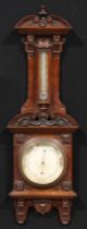A late Victorian mahogany barometer, 19cm register inscribed Short & Mason, 40. Hatton Garden,