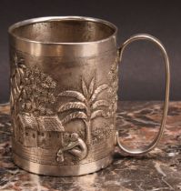 An Indian silver mug, repousse chased with figures and buildings in a landscape, 7.5cm high, c.1880,