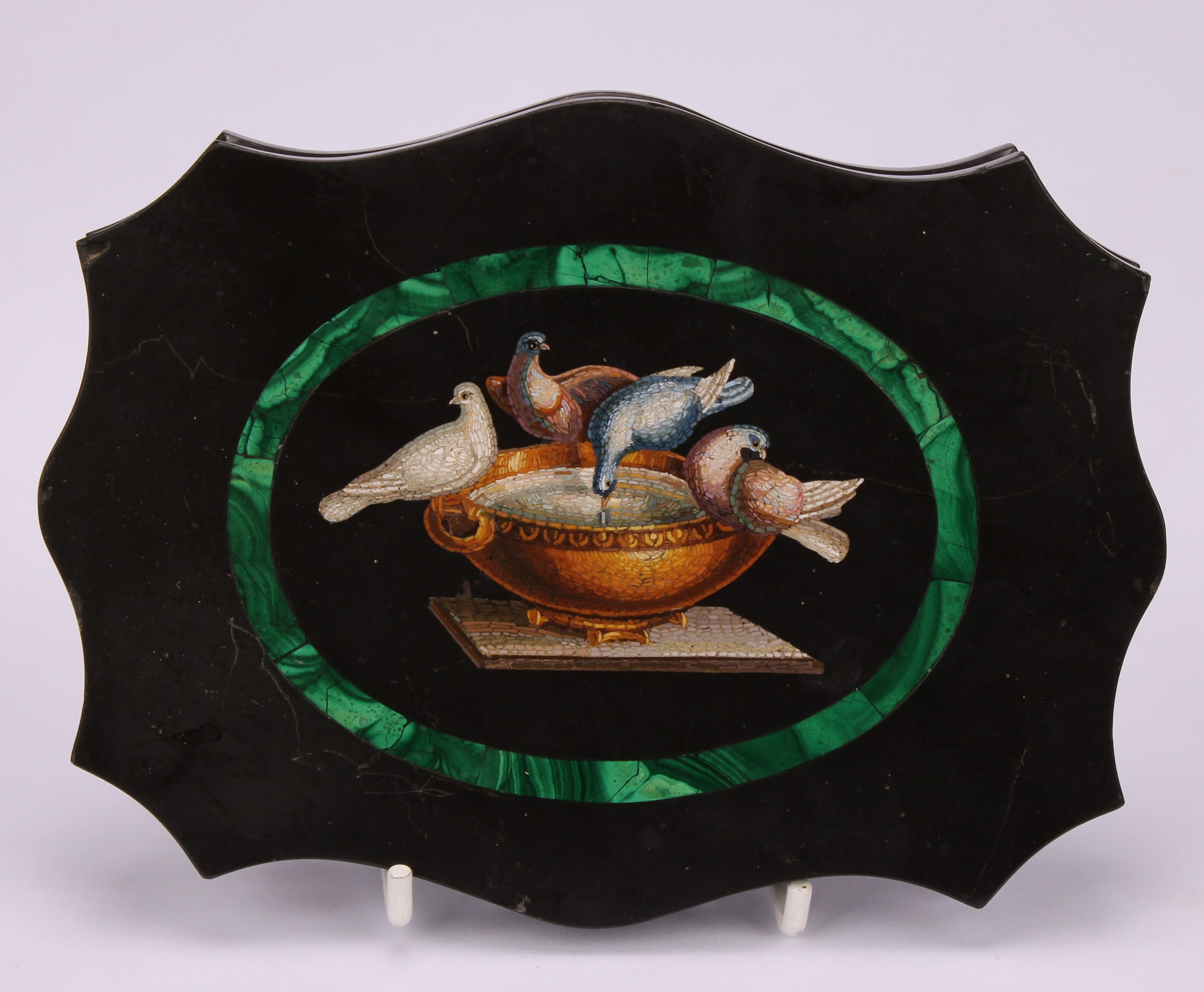 An Italian Grand Tour micro-mosaic cartouche shaped black marble desk weight, decorated in - Image 5 of 5