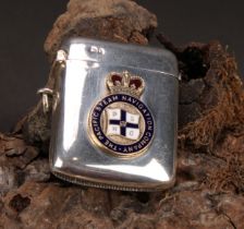 An Edwardian silver and enamel rounded rectangular vesta case, applied with the insignia of The