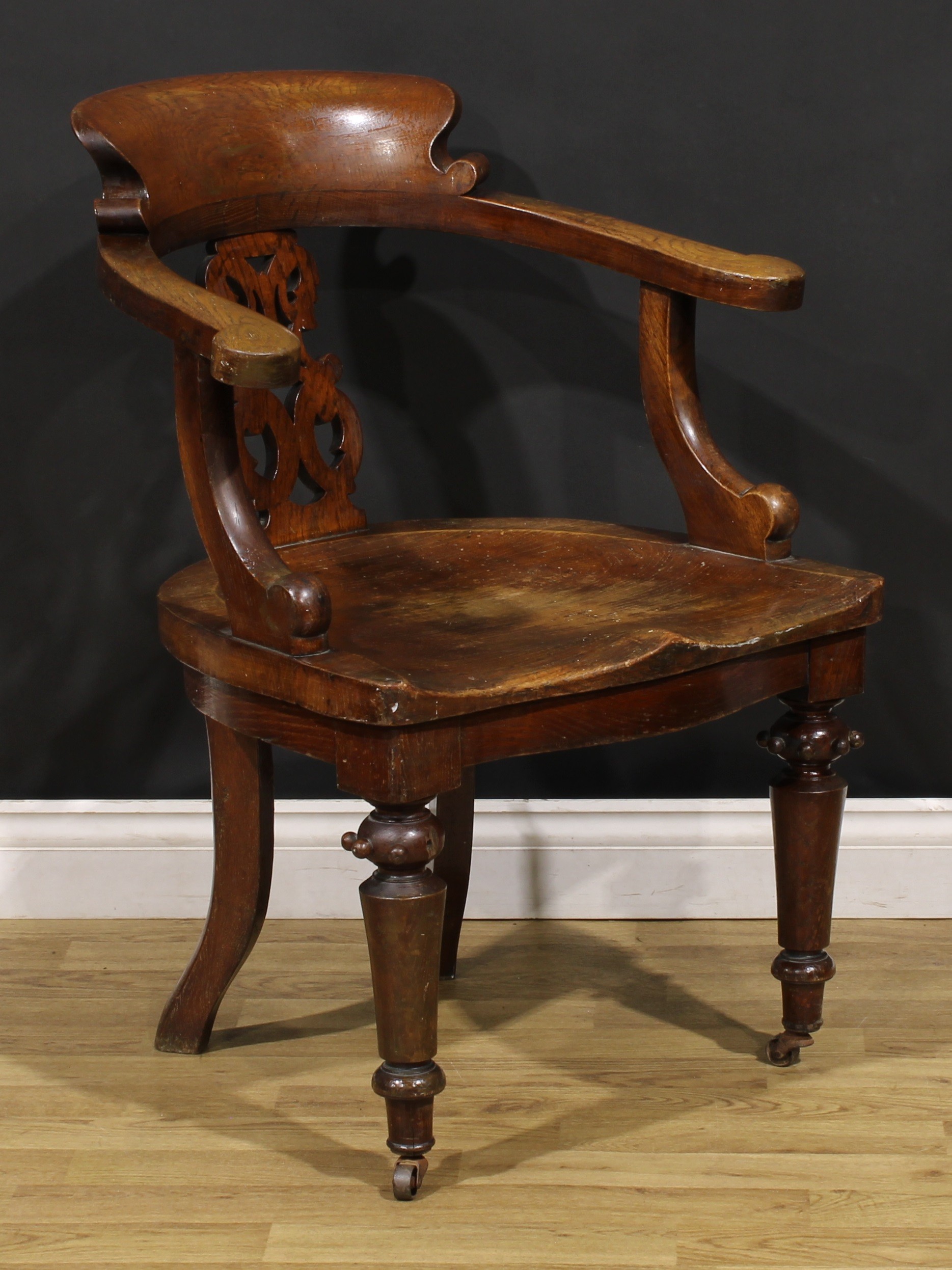 A Victorian oak desk chair, by Thomas Simpson & Sons, Halifax, Yorkshire (fl.1876-1954), badged, - Image 2 of 4