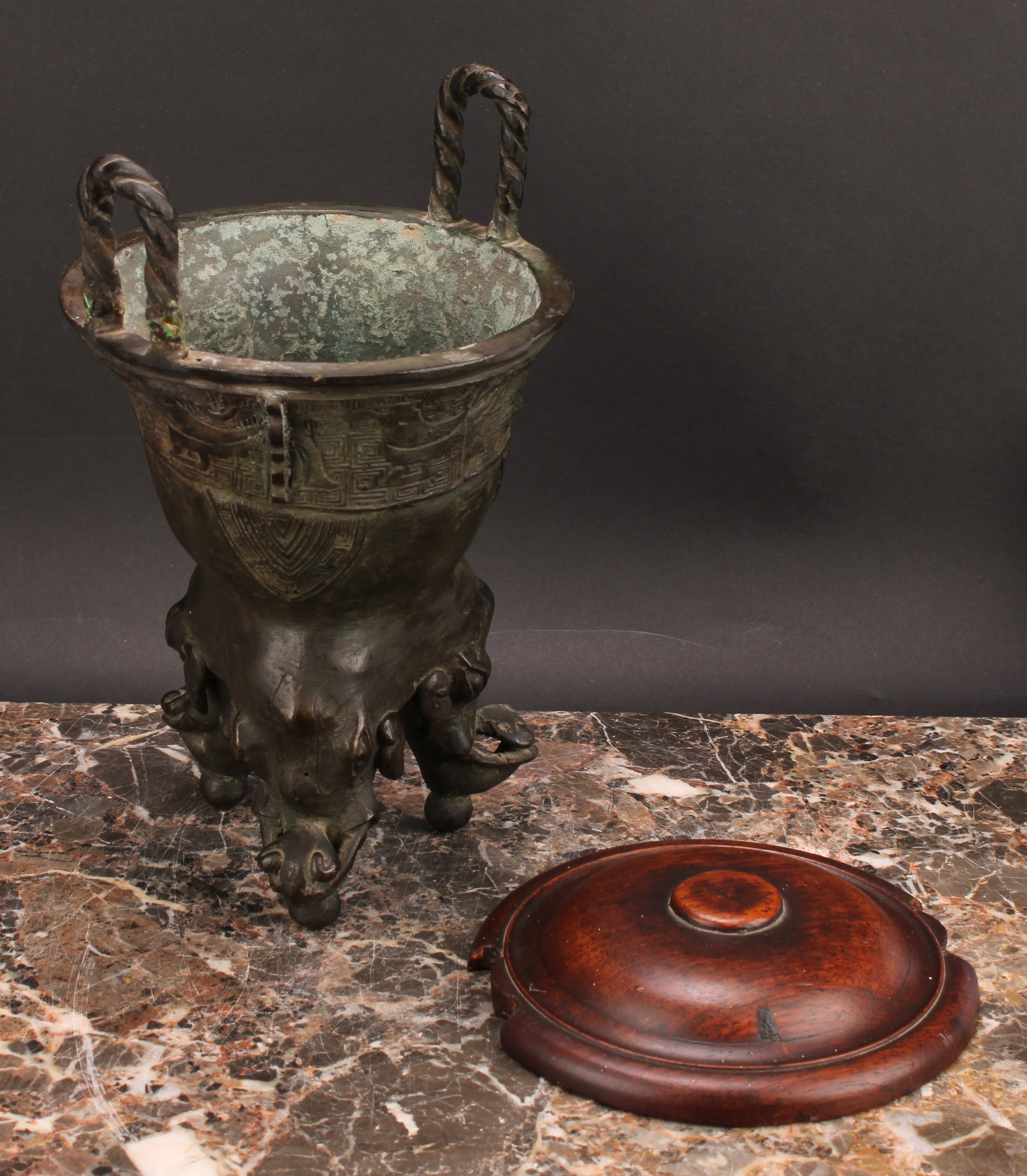 A Chinese patinated bronze ding censer, cast in the archaic manner, twist handles, outswept rim, - Image 4 of 5