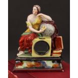 A Staffordshire pearlware pocket watch stand, modelled as Urania, The Muse of Astronomy, seated upon