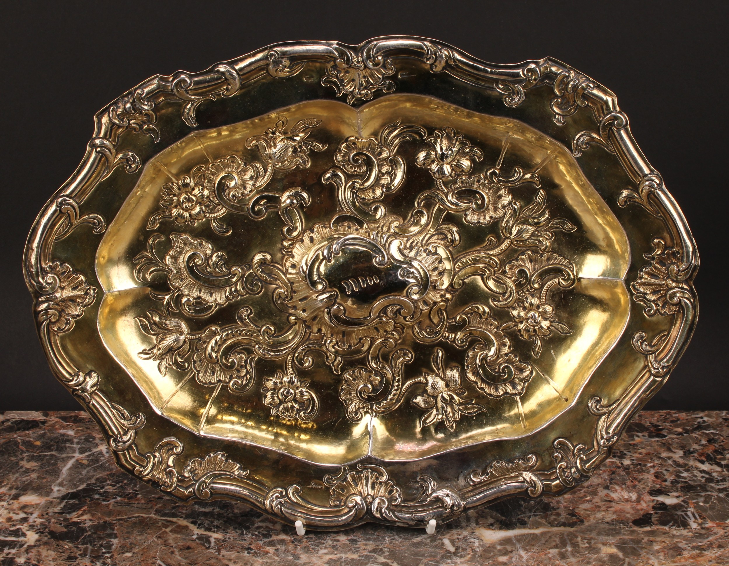 An 18th century Spanish silver-gilt shaped oval sideboard dish, chased with flowers and leafy - Image 2 of 5