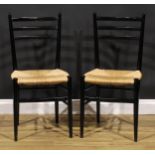 A pair of mid-20th century Italian ebonised beech side chairs, in the manner of Gio Ponti’s