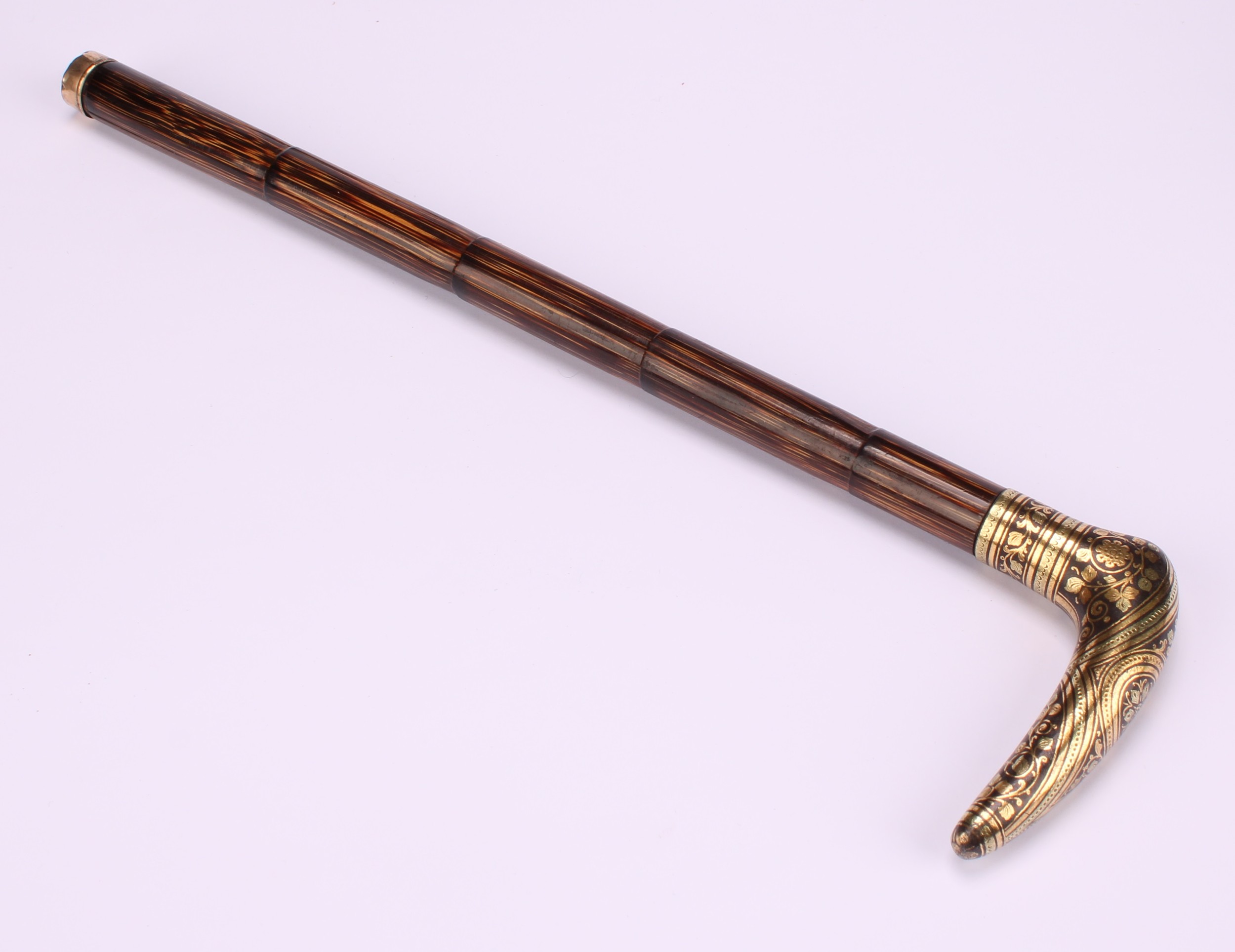 An early 20th century Toledo gold damascened steel parasol handle, eight tips ensuite, 11cm wide, - Image 5 of 6