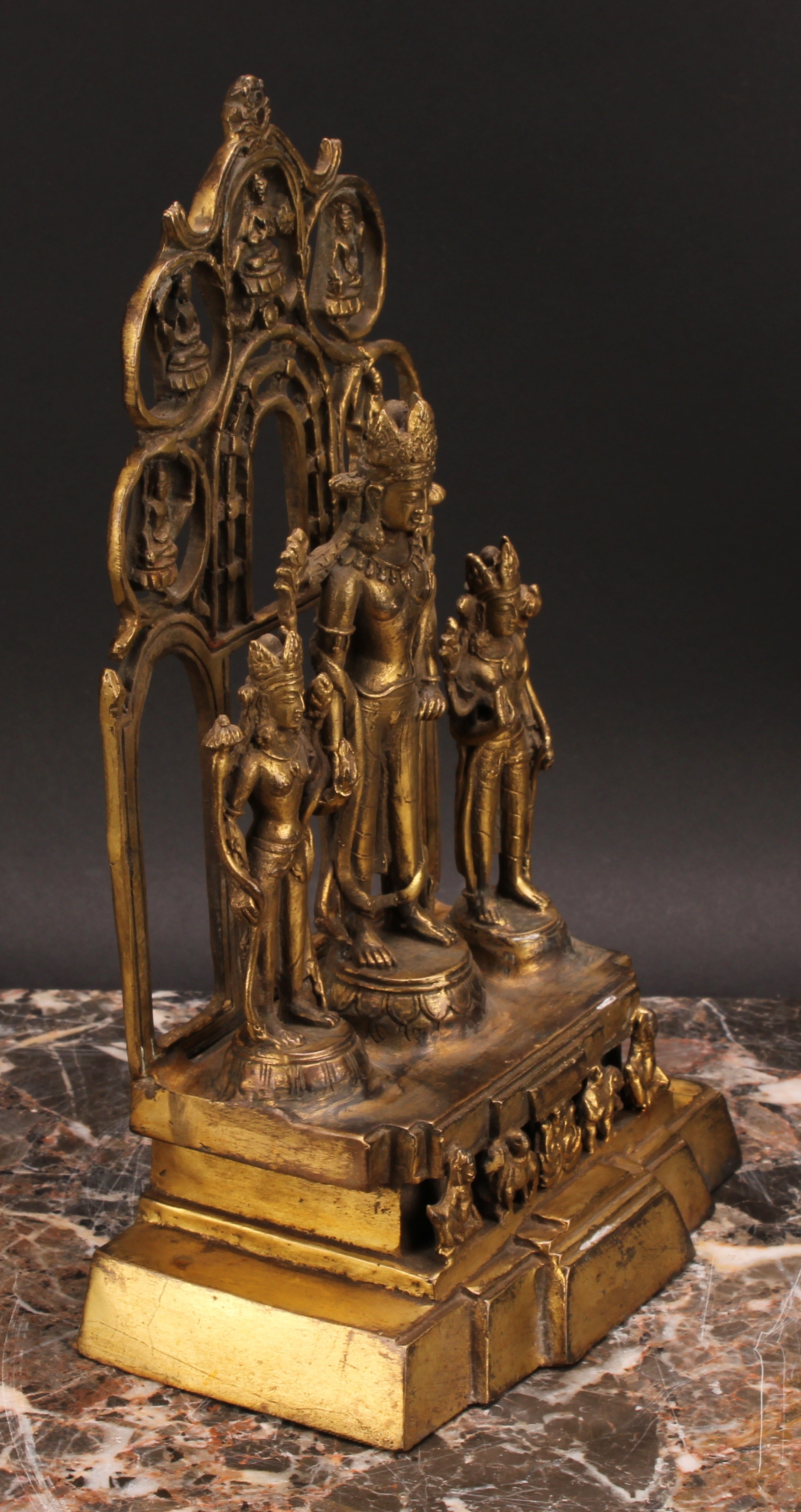 A Chinese/Tibetan gilt bronze shrine figure, cast with three figures, calligraphy script to verso, - Image 3 of 5