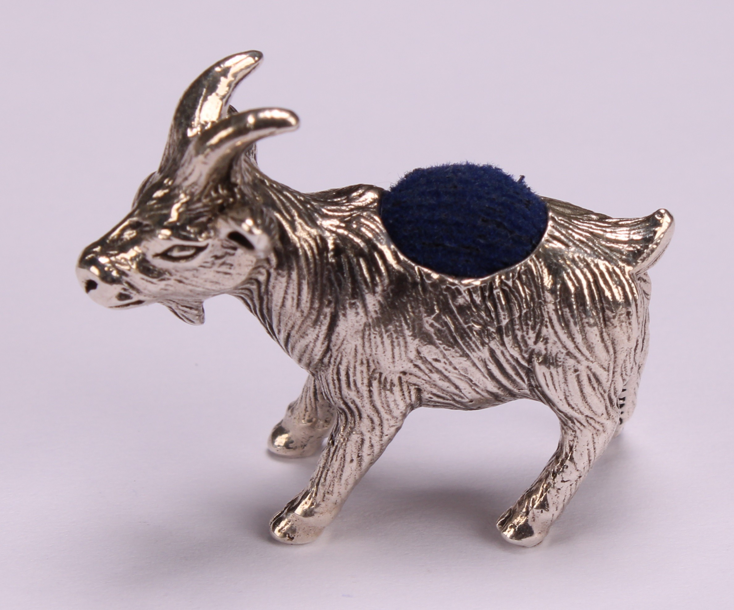 A sterling silver novelty pin cushion, as a goat, 3.5cm long - Image 2 of 4