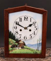 An Arts & Crafts period oak wall clock, 20cm enamel dial decorated with an Alpine chalet, Arabic