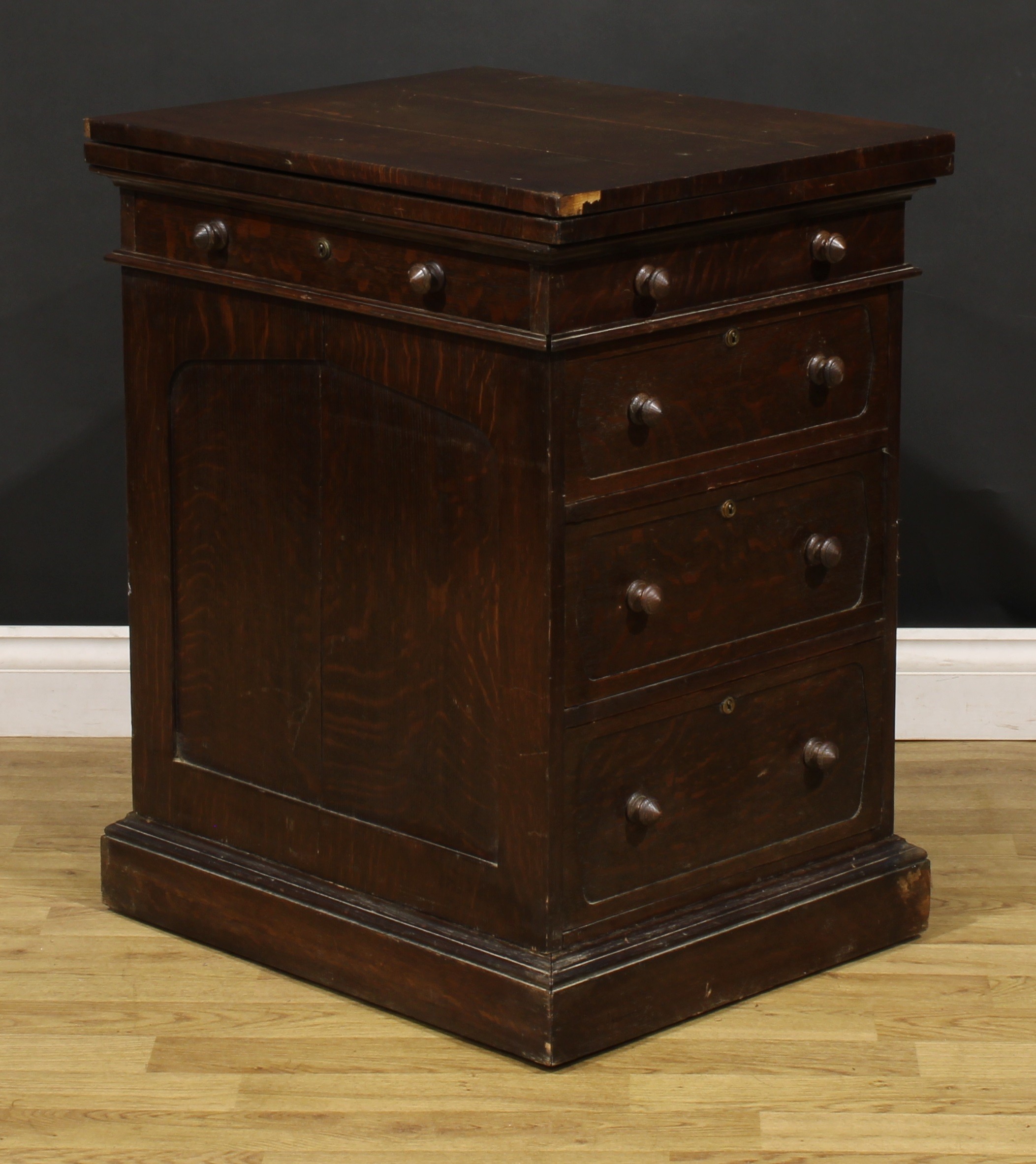 A late 19th century oak single pedestal desk, hinged top enclosing a baize surface above a long - Image 5 of 6