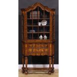 An 18th century style Dutch marquetry display cabinet, of small and neat proportions, arched cornice