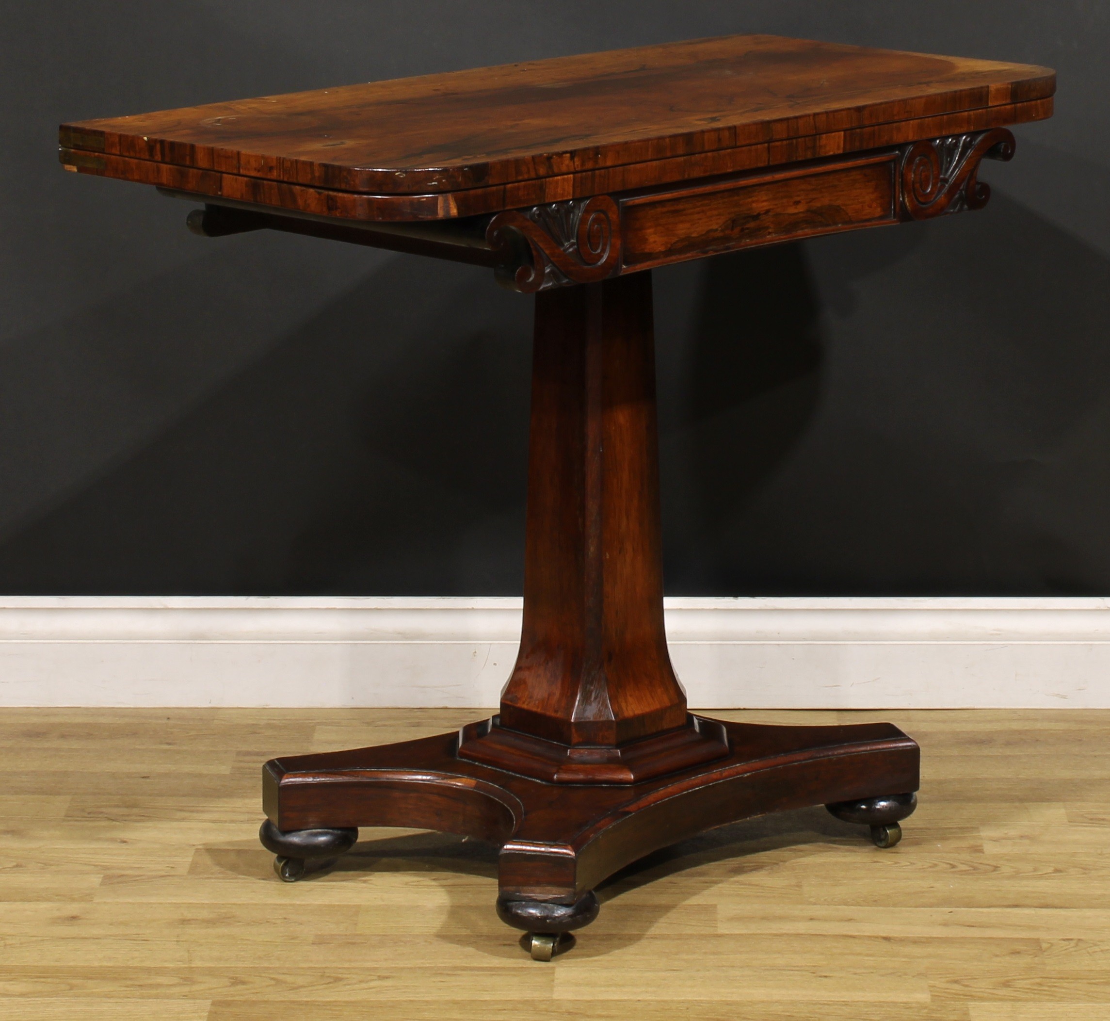 A William IV rosewood card table, rounded rectangular folding top above a frieze carved with leafy - Image 3 of 5