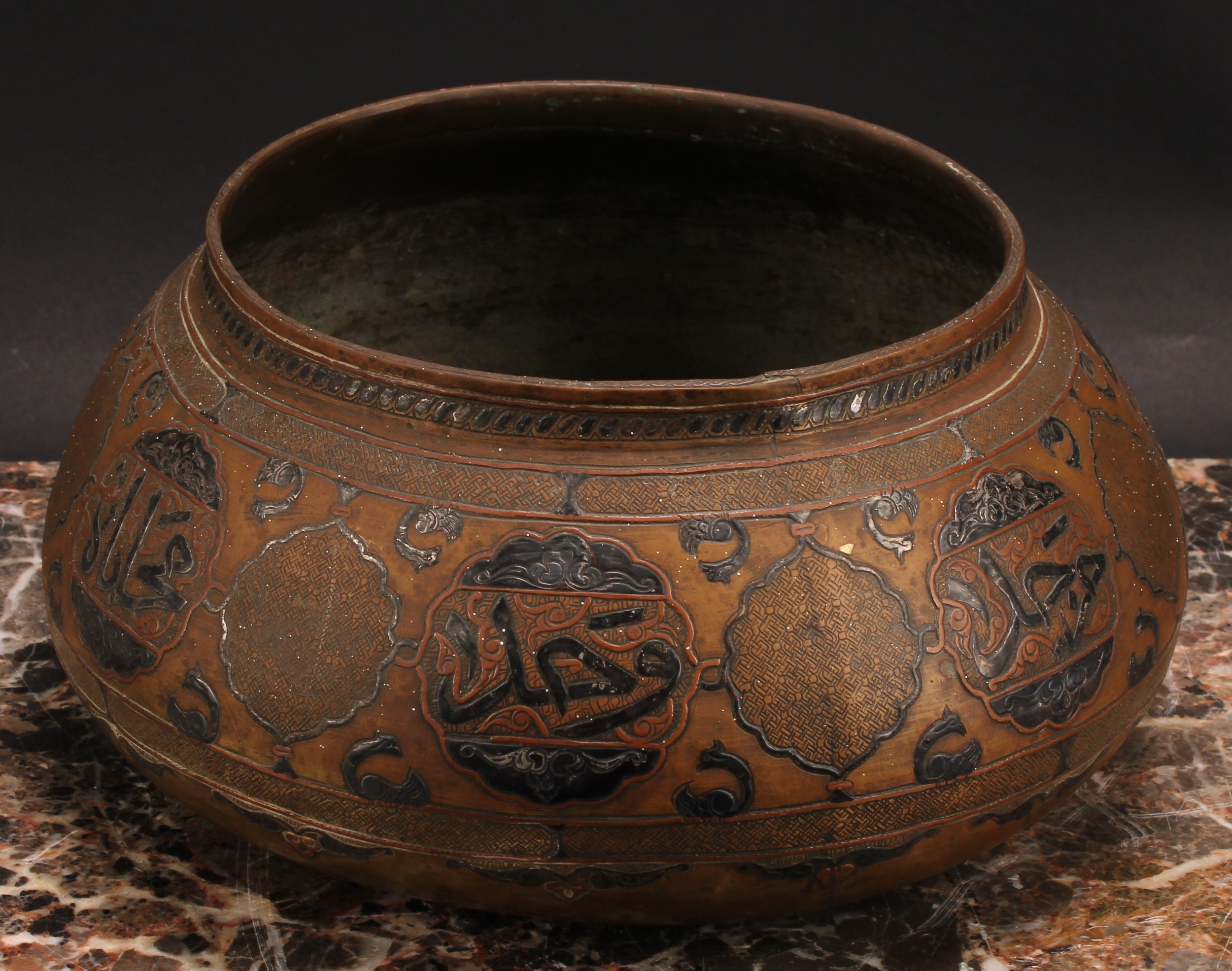 A Middle Eastern silver and copper damascened brass bowl, decorated in the Islamic taste with - Image 3 of 3