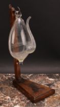A 19th century Dutch weather glass or donderglas barometer, 23.5cm long, later folding stand
