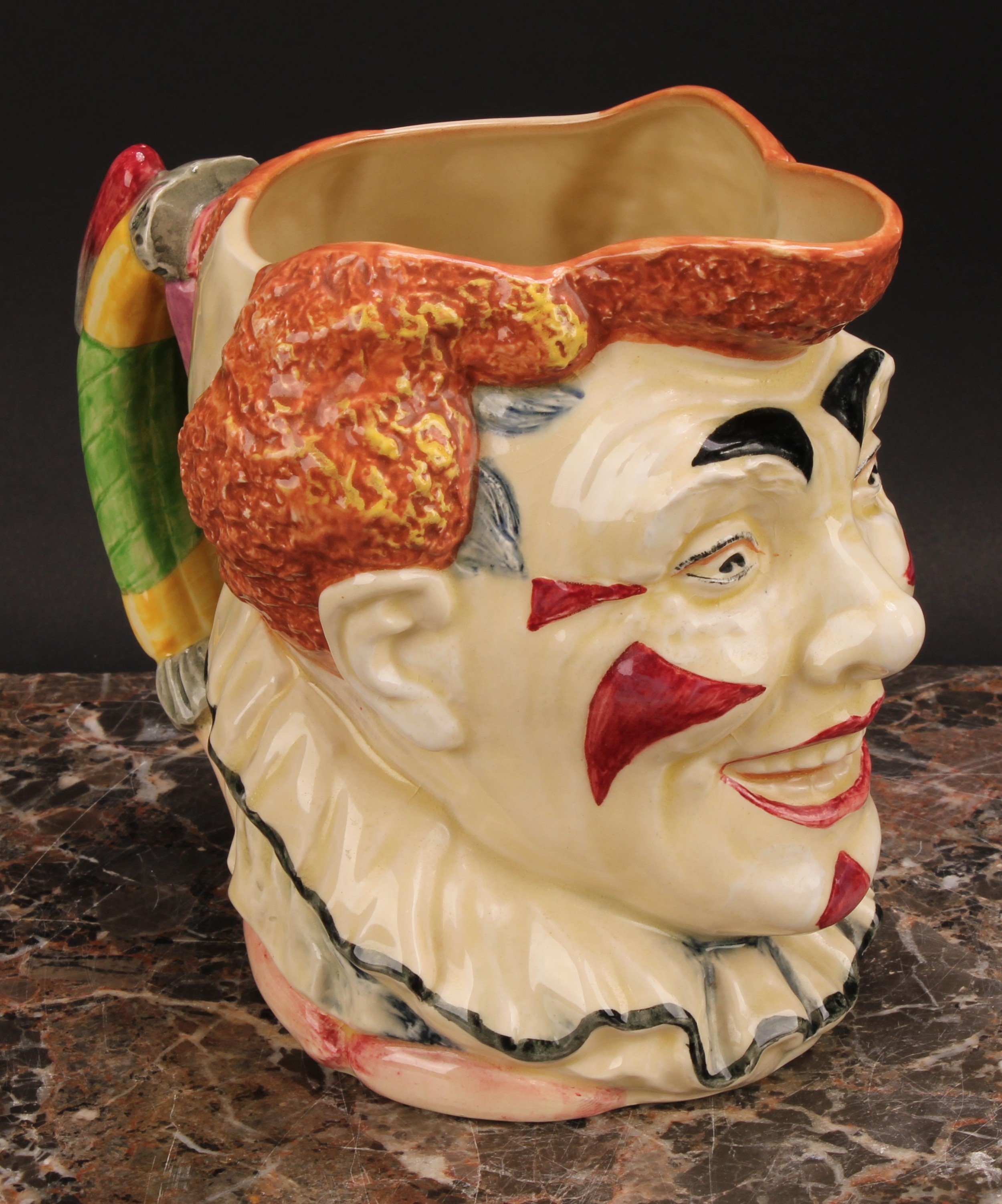 A Royal Doulton character jug, The Clown, designed by H. Fenton, decorated in polychrome with red - Bild 2 aus 5