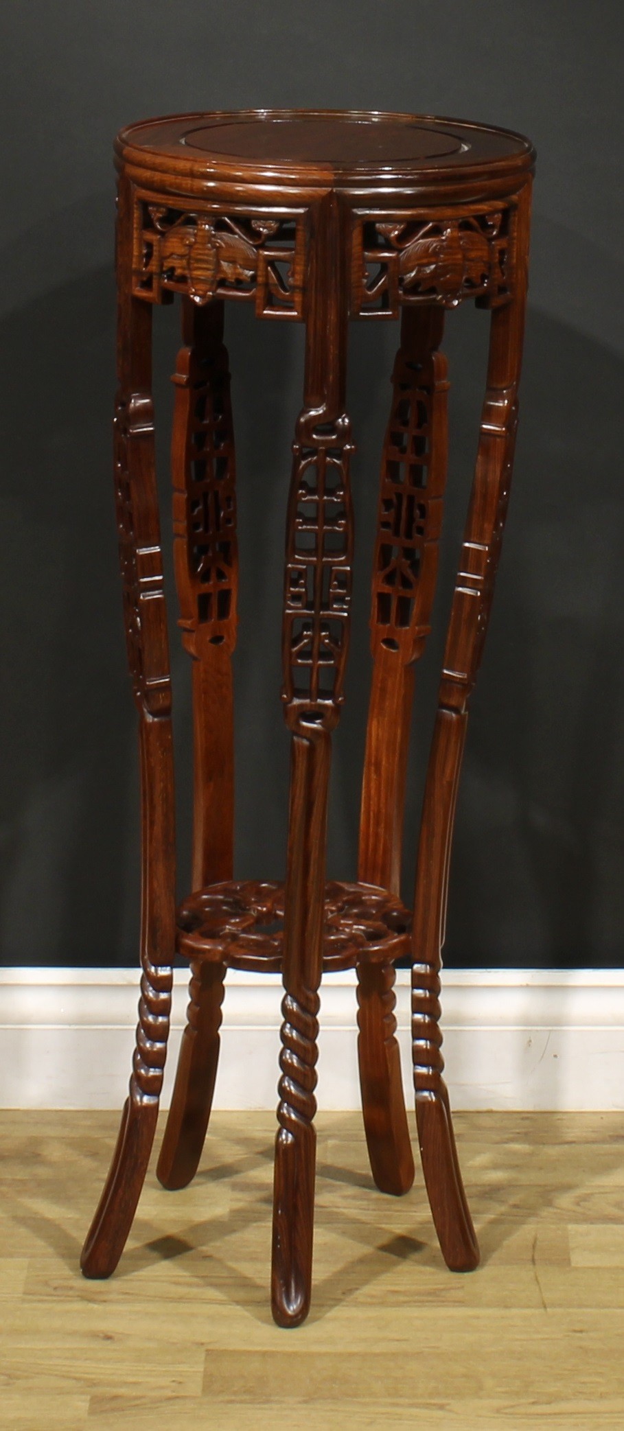 A Chinese hardwood jardiniere stand, pierced and carved with bats and scrolls, 87cm high, 30.5cm - Image 2 of 3