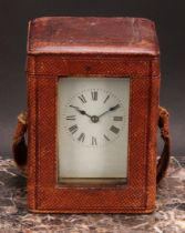 An early 20th century brass carriage clock, 5.5cm rectangular enamel dial inscribed with Roman