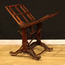 An early Victorian rosewood artist’s folio stand, each wing angle-adjustable on a ratchet, turned