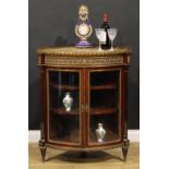 A Louis XV Revival gilt metal mounted mahogany floor standing corner vitrine, marble top with