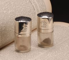 A pair of late Victorian silver mounted travelling peppers, domed screw-fitting covers, 6.5cm
